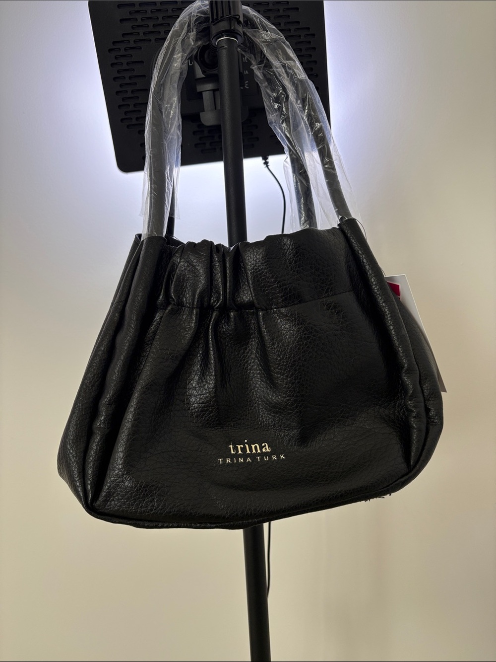 Trina Turk Black Gathered Shoulder Bag with Gold Logo